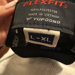 Travis Mathew white claw hat